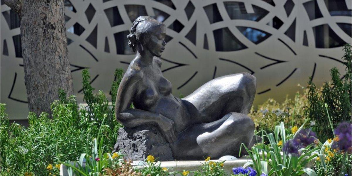 A sculpture set in the garden of a residence under the “Art for every building” charter